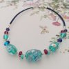 Collier tour de cou perles de verre filé**